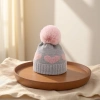A grey woolen hat paired with a pink woolen heart-shaped pattern warm knitted women's hat Application Scenario